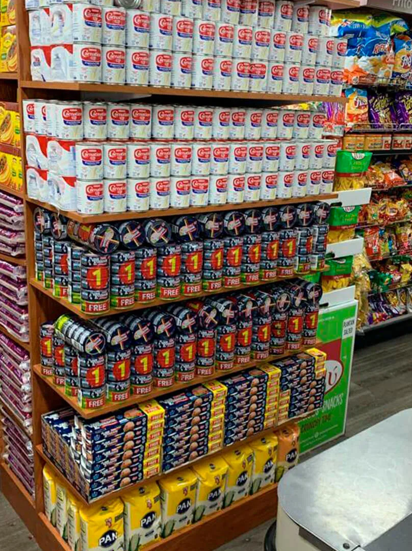 shelf with cans and bread flour