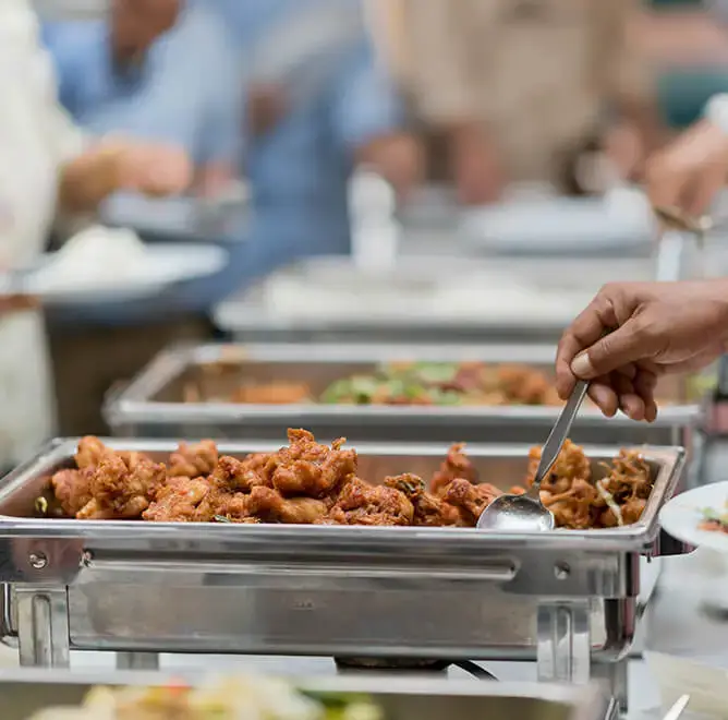 person serving meat