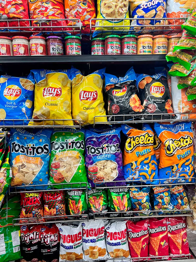 Shelf of snacks and candies at La Placita Meat Market